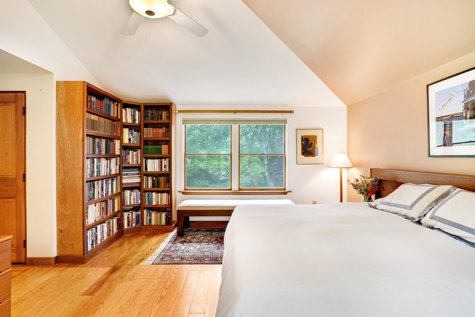174 Middle Road Chilmark, MA 02535 - Photo 20 of 40 a bedroom with a bed and a large window with outer view