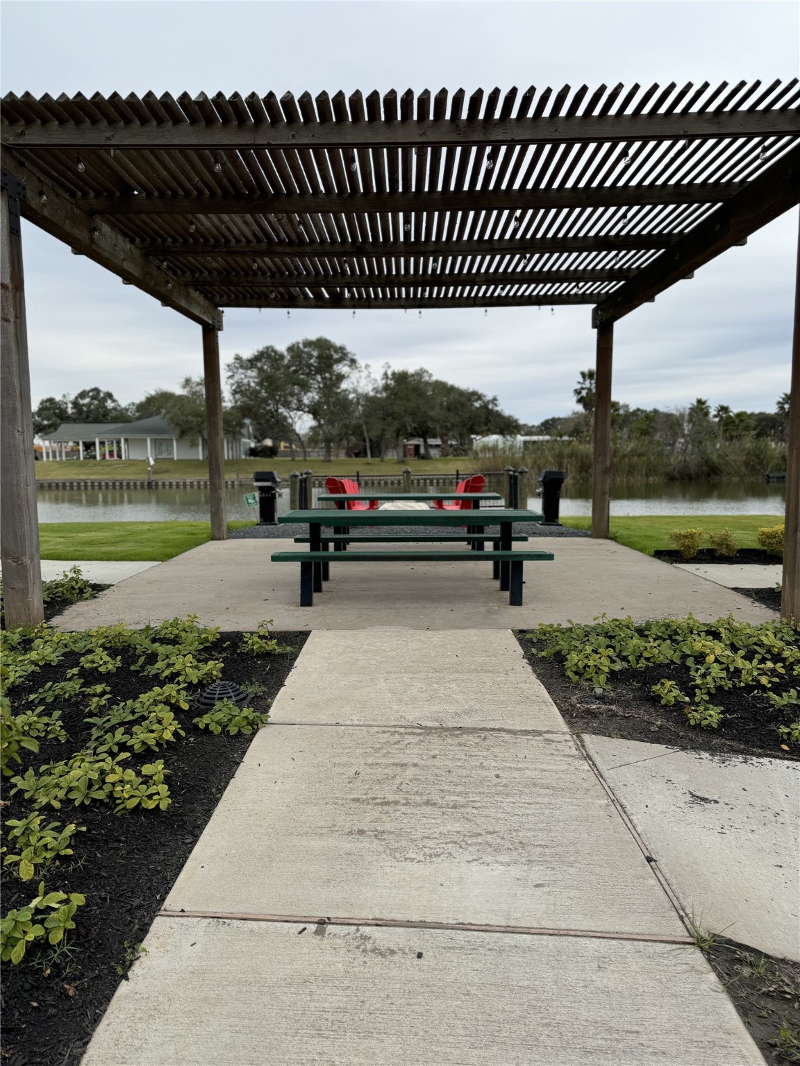3127 Maverick Loop, Unit 36 Freeport, TX 77541 - Photo 11 of 16 a view of swimming pool with a patio