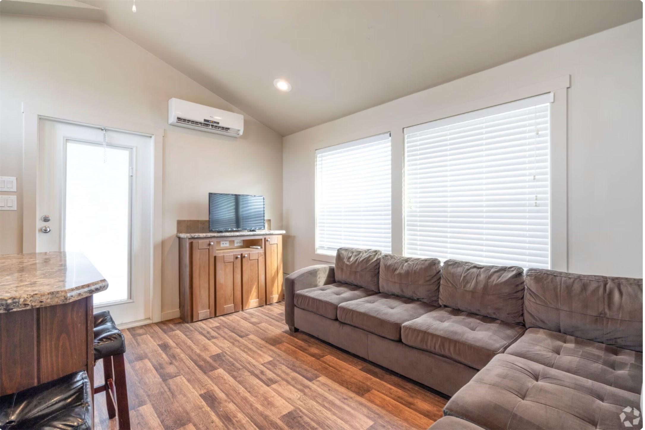 3127 Maverick Loop, Unit 36 Freeport, TX 77541 - Photo 4 of 16 a living room with furniture and a flat screen tv