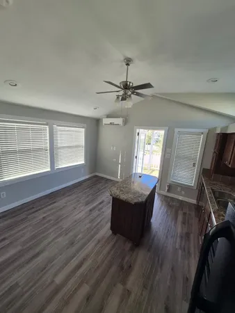 a kitchen with a stove and a sink