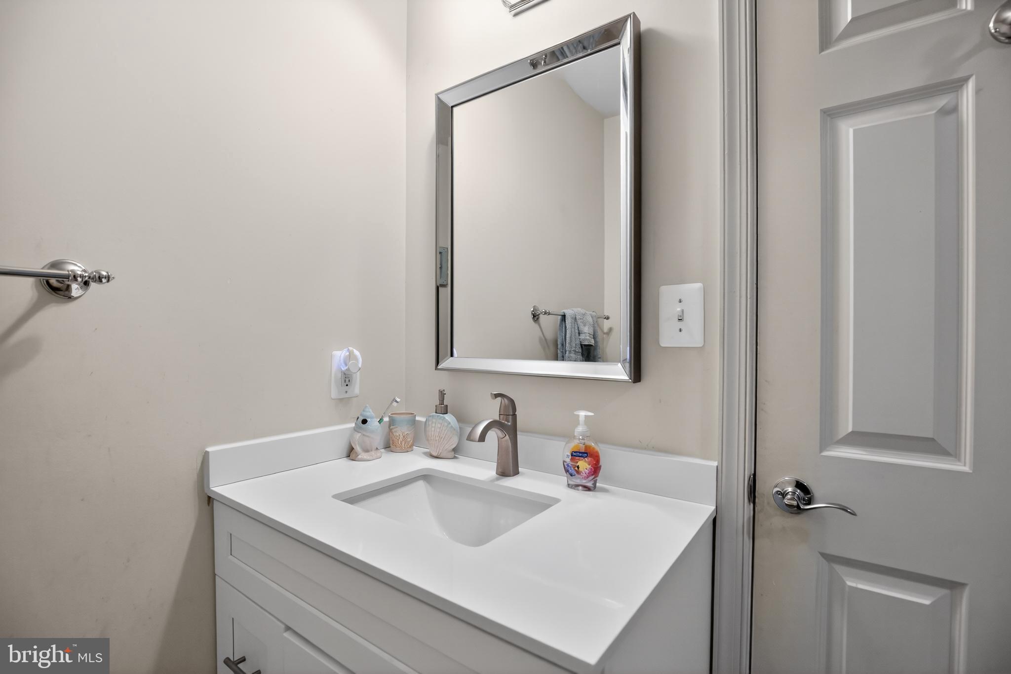 1810 Rudolph Lane Lusby, MD 20657 - Photo 26 of 40 Hallway bath upper level entry w/sink