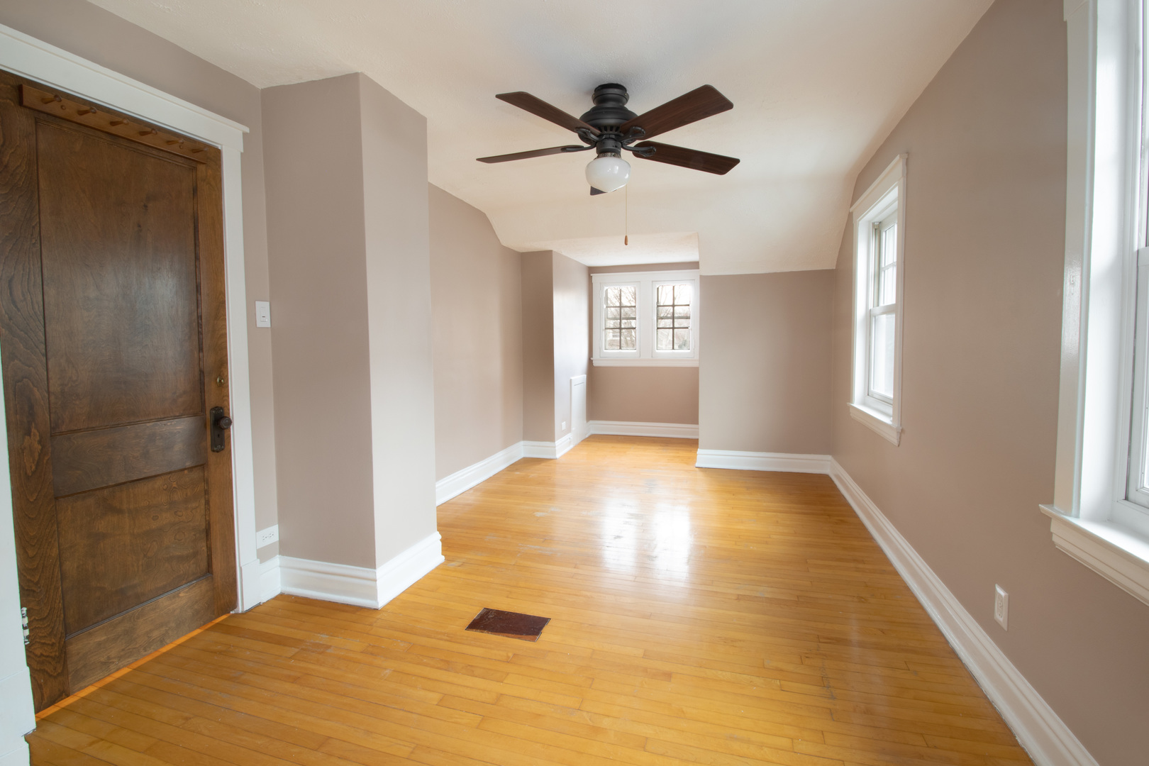 261 Blackhawk Road Riverside, IL 60546 - Photo 13 of 31 a view of a livingroom with a window and wooden floor