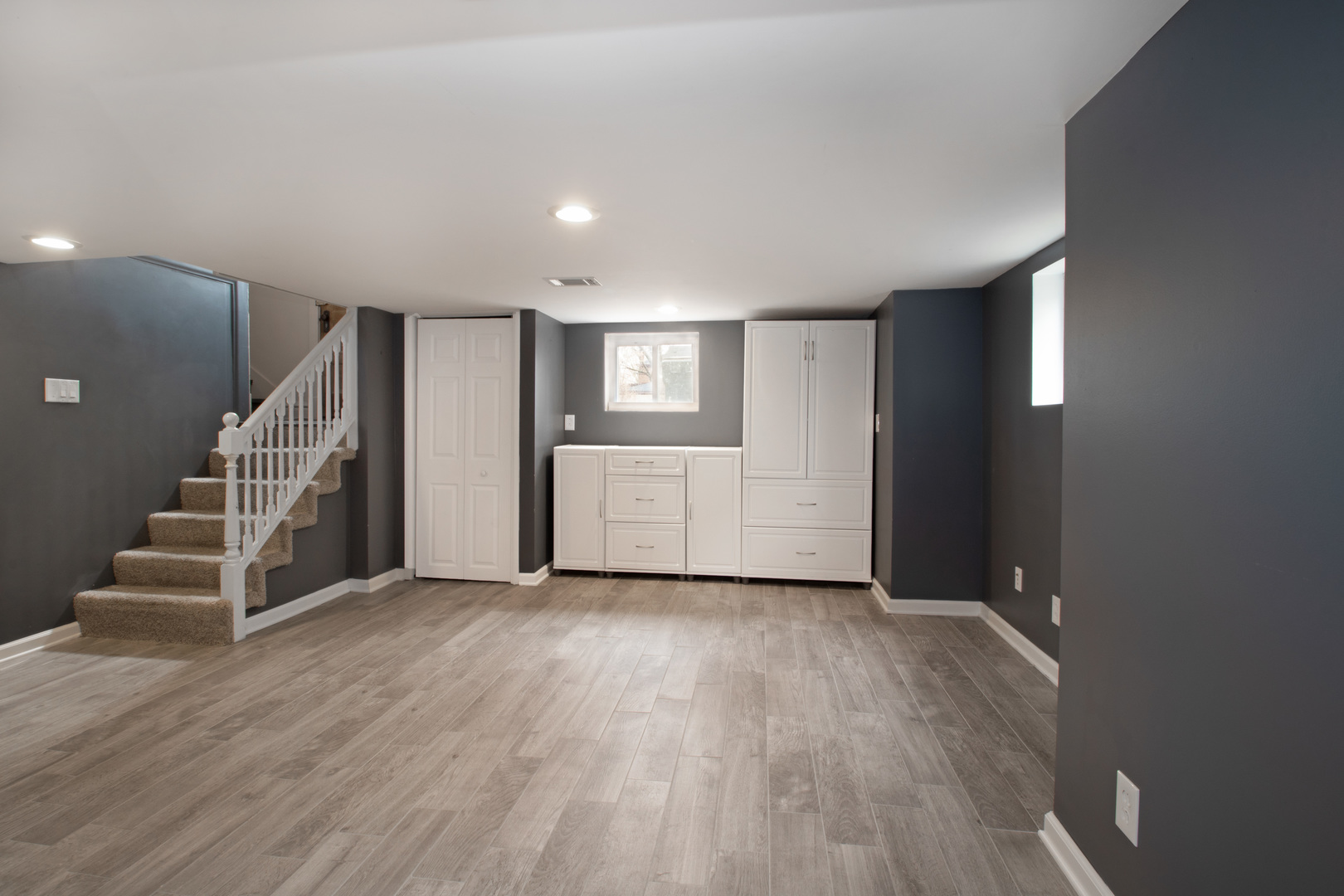261 Blackhawk Road Riverside, IL 60546 - Photo 18 of 31 a view of an empty room with stairs and ventilation