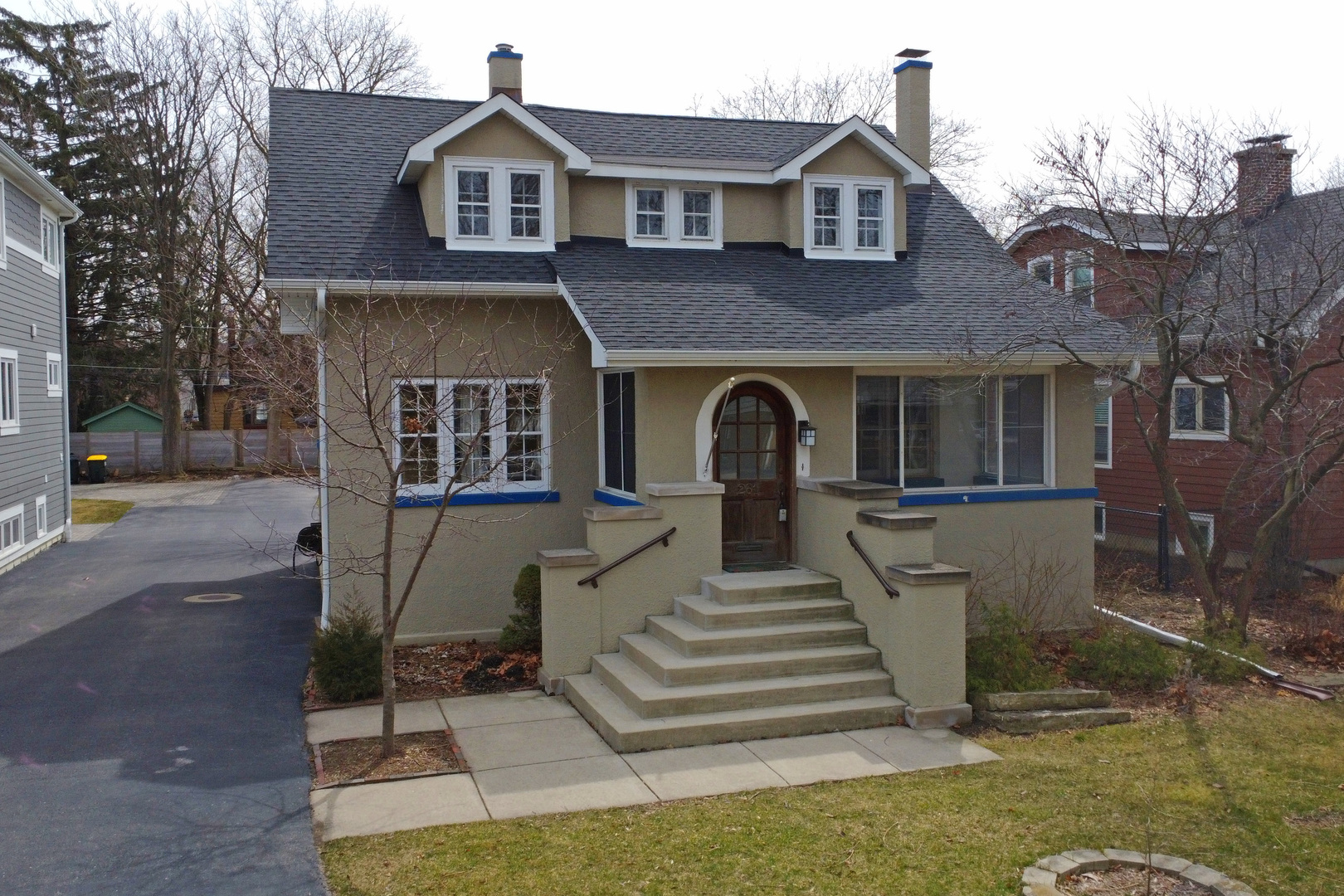 261 Blackhawk Road Riverside, IL 60546 - Photo 2 of 31 a front view of a house with a yard