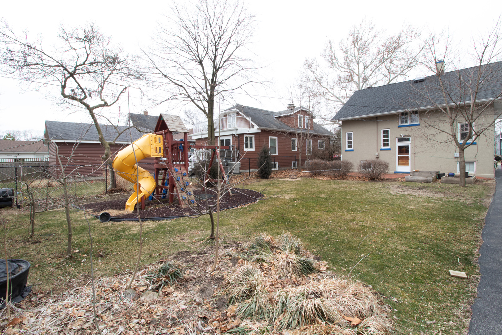 261 Blackhawk Road Riverside, IL 60546 - Photo 23 of 31 a view of a yard with a house