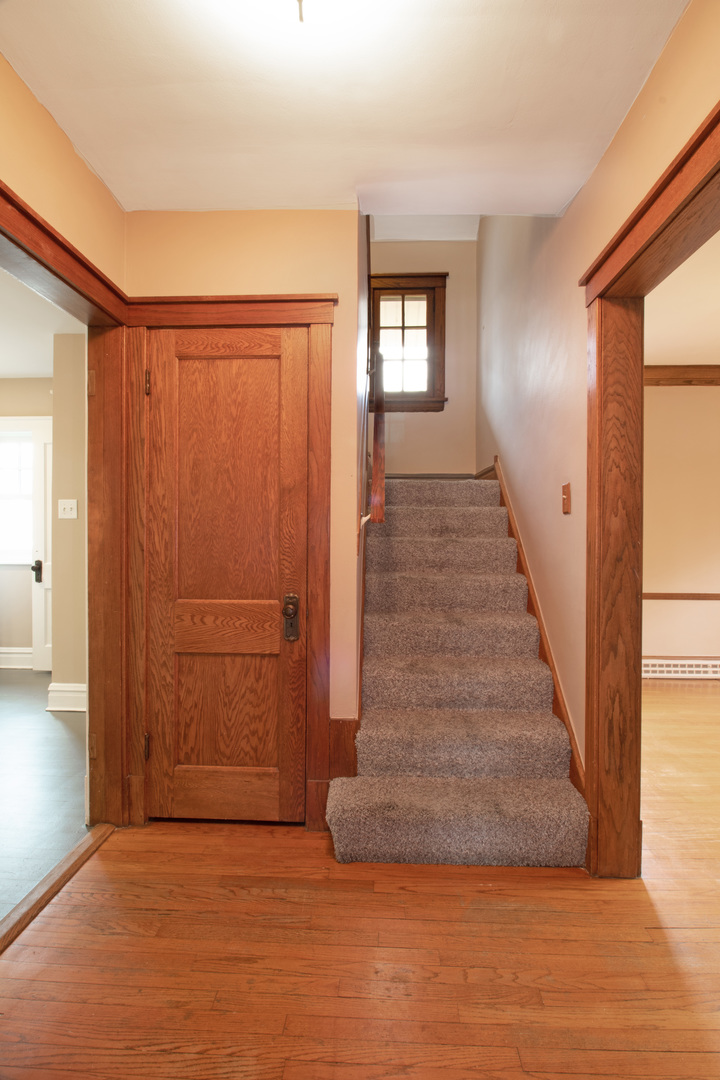261 Blackhawk Road Riverside, IL 60546 - Photo 10 of 31 a view of an entryway with wooden floor and door