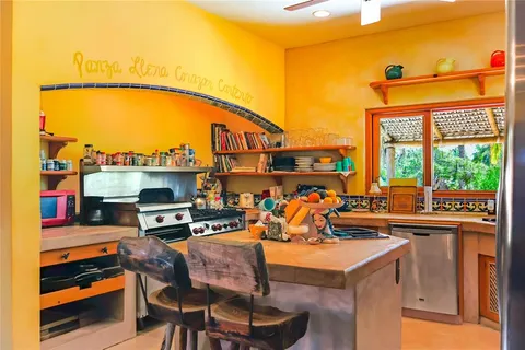 a view of a chairs and table in the terrace