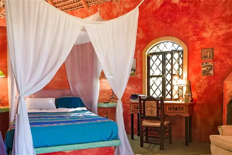 a view of a kitchen with a sink and cabinets
