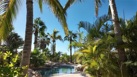 a view of a backyard of a house