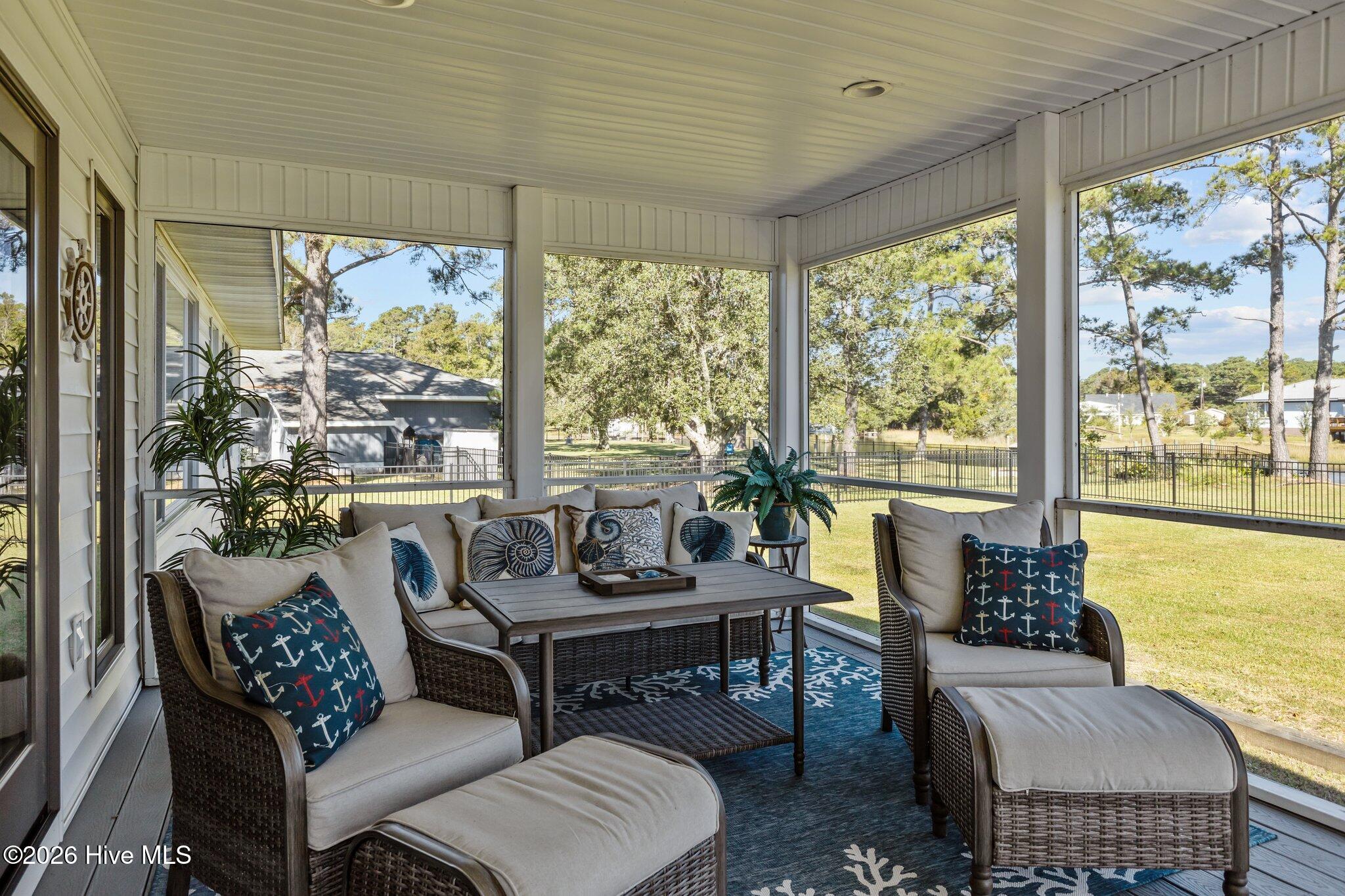 180 Wallace Road Beaufort, NC 28516 - Photo 8 of 45 Beautifully decorated screened in porch