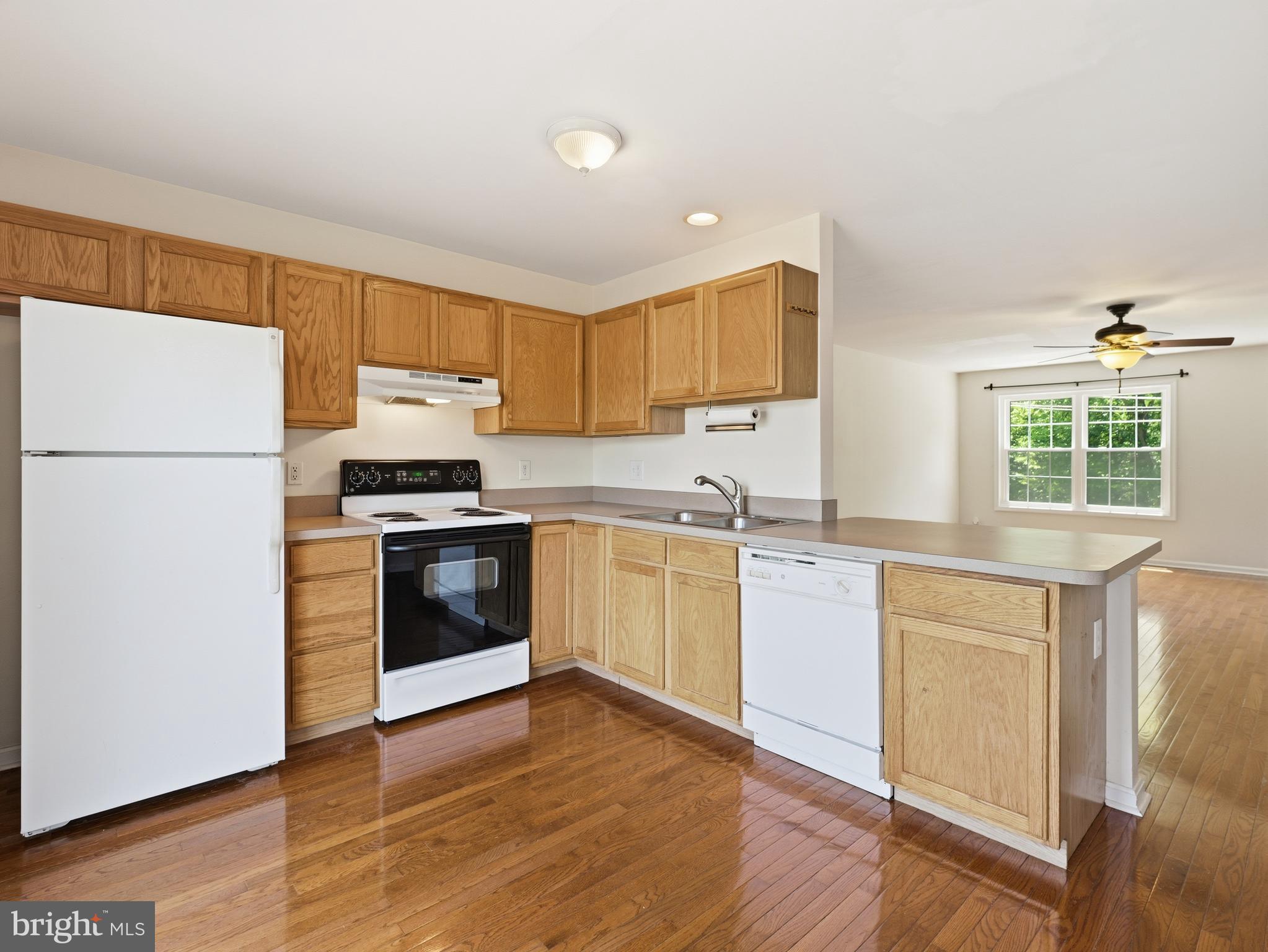 106 Washington Street Inwood, WV 25428 - Photo 5 of 43 Hardwood Floors in Kitchen