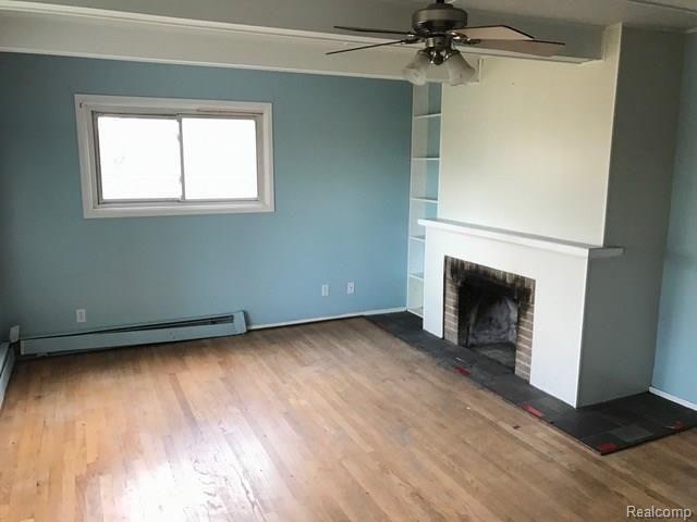 3945 Levalley Road Columbiaville, MI 48421 - Photo 7 of 44 living 2.jpeg