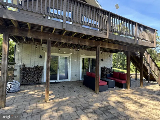 a view of balcony with wooden floor