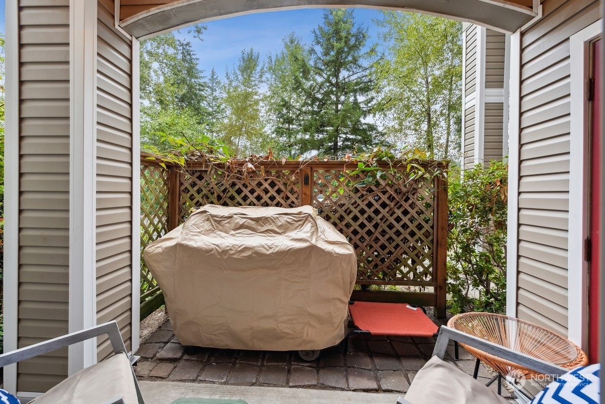 10709 Valley View Road, Unit C103 Bothell, WA 98011 - Photo 19 of 30 a view of balcony with wooden floor