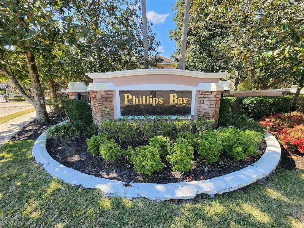 7511 Bayport Road, Unit 5 Orlando, FL 32819 - Photo 18 of 26 a view of sign board and yard
