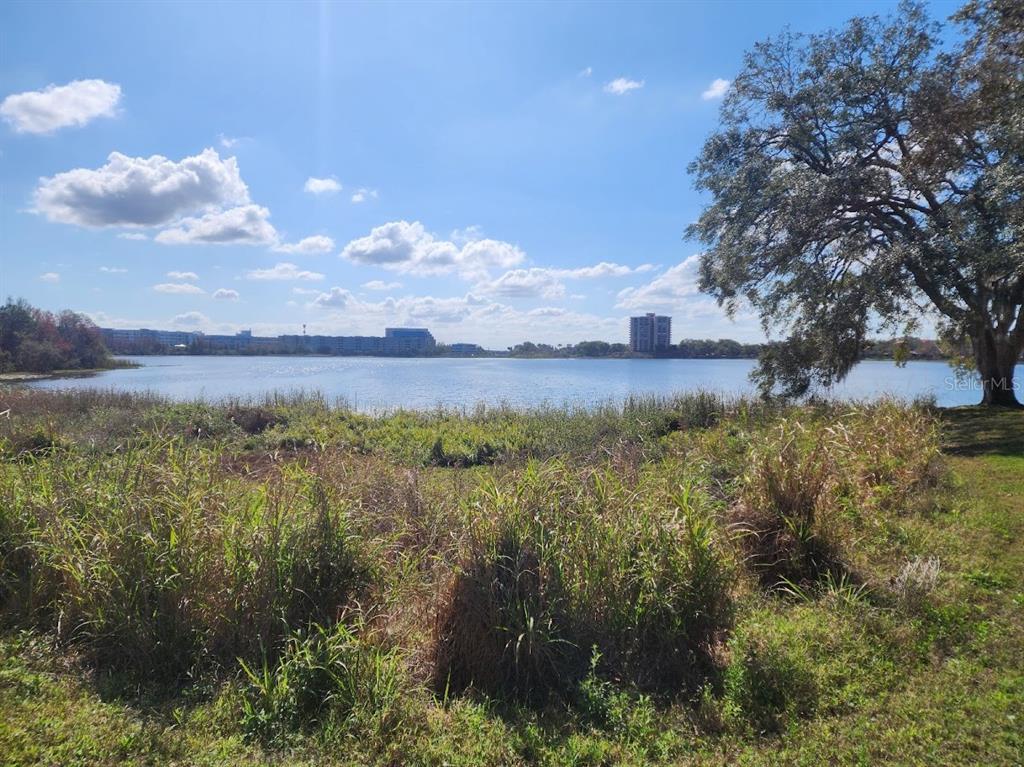 7511 Bayport Road, Unit 5 Orlando, FL 32819 - Photo 22 of 26 a view of mountain with sunset in background