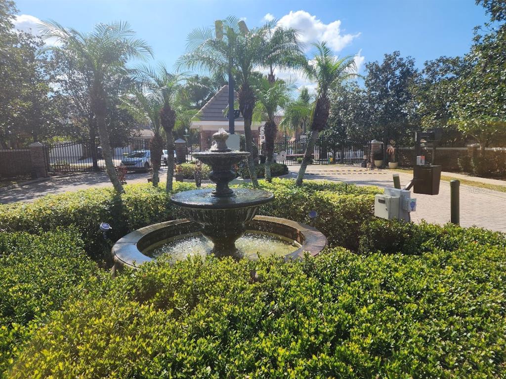 7511 Bayport Road, Unit 5 Orlando, FL 32819 - Photo 26 of 26 a view of a garden with a fountain
