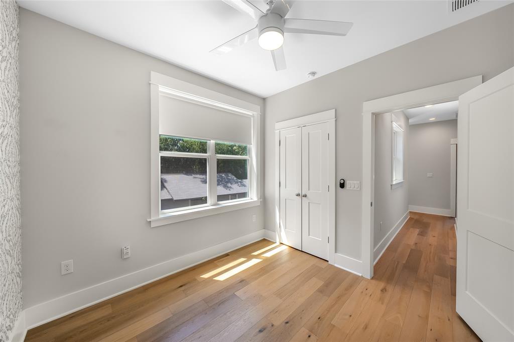 2821 Castro Street, Unit 1 Austin, TX 78702 - Photo 17 of 21 Light wood-finish flooring with crisp white trim throughout