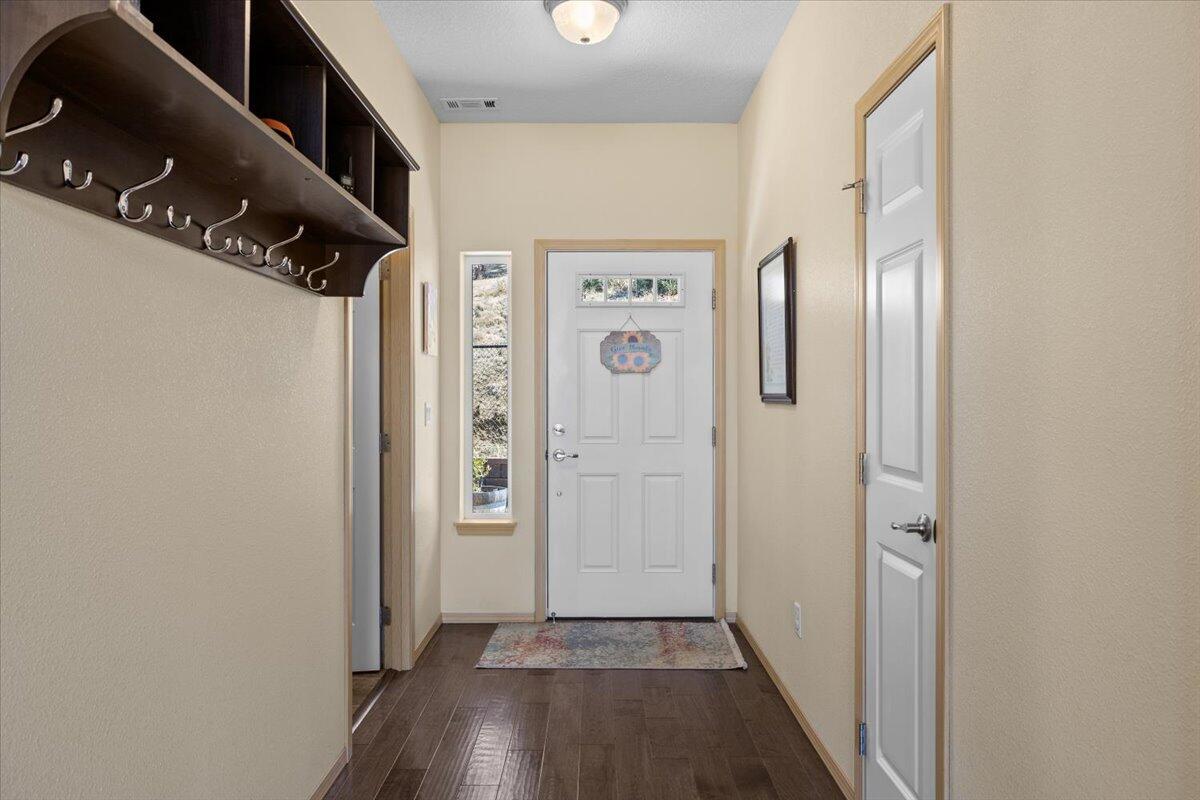 4856 Payne Road Medford, OR 97504 - Photo 17 of 49 Inside front door, with laundry/mud room to left
