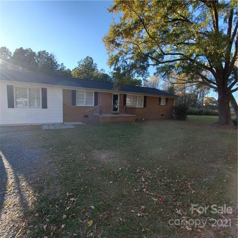 217 McBride Lumber Road Star, NC 27356 - Photo 3 of 16 a house view with a backyard space