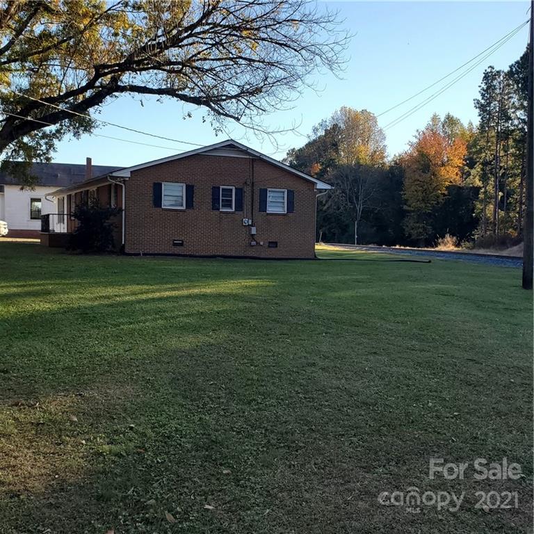 217 McBride Lumber Road Star, NC 27356 - Photo 4 of 16 a house view with a backyard space