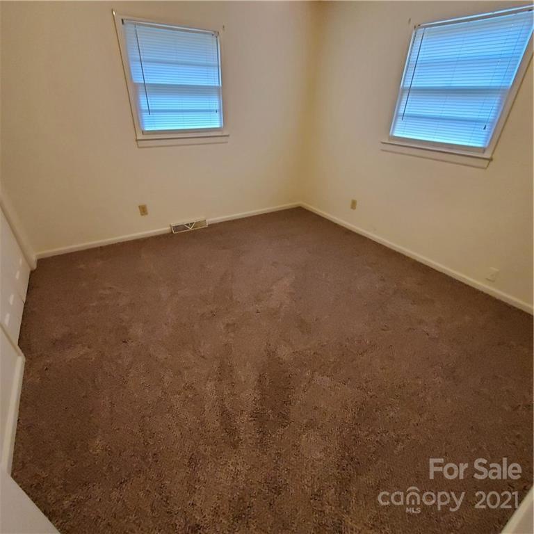 217 McBride Lumber Road Star, NC 27356 - Photo 5 of 16 an empty room with a window