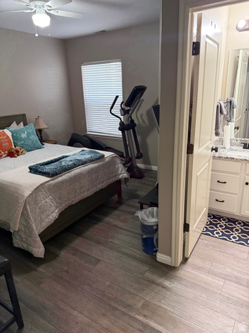 14797 South Chandlerpoint Way Draper, UT 84020 - Photo 22 of 33 Bedroom featuring wood-finish plank flooring, ceiling fan with integrated lighting, and a window with blinds