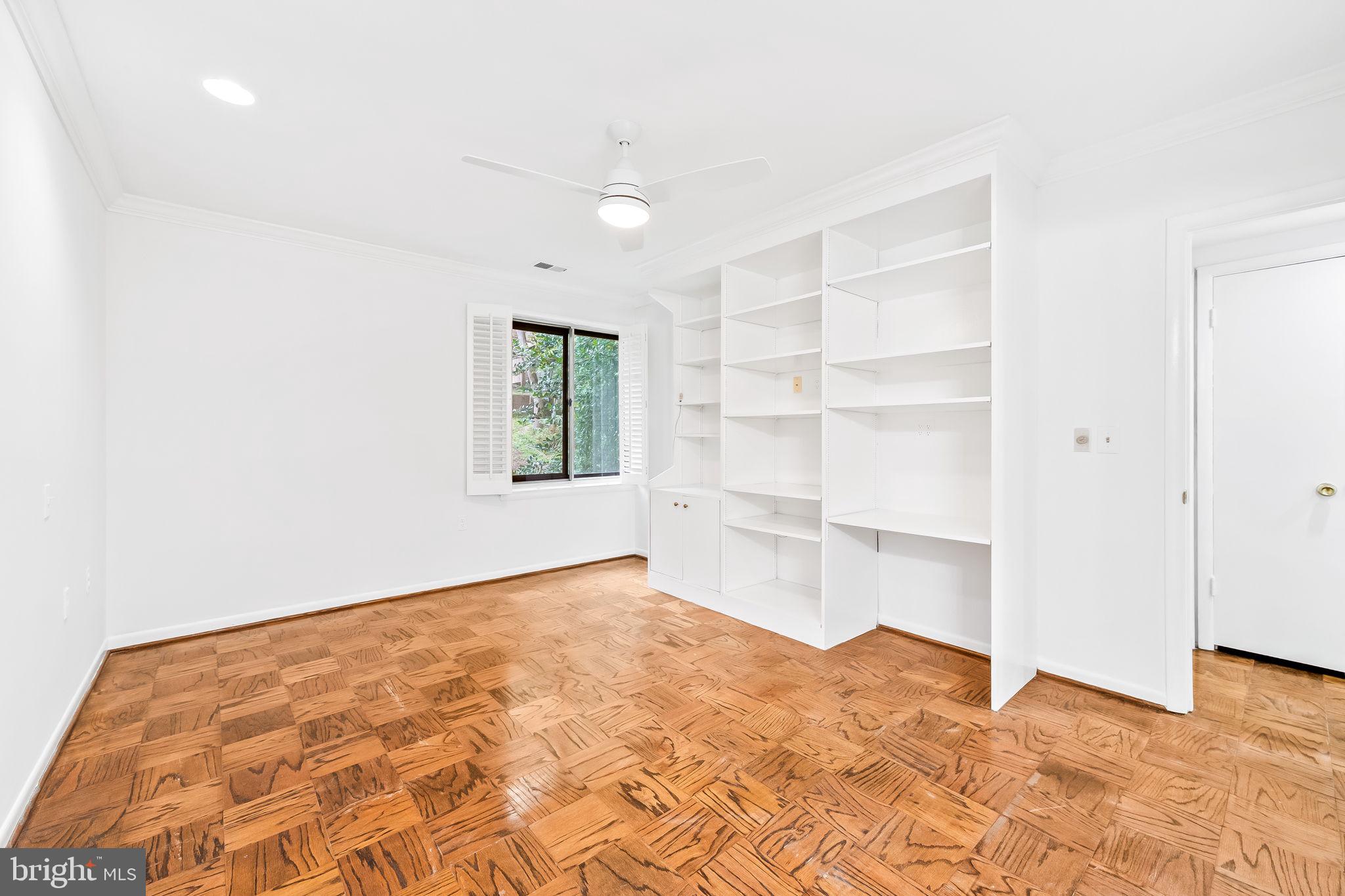 108 Cross Keys Road, Unit R108D Baltimore, MD 21210 - Photo 21 of 37 built ins in primary bedroom