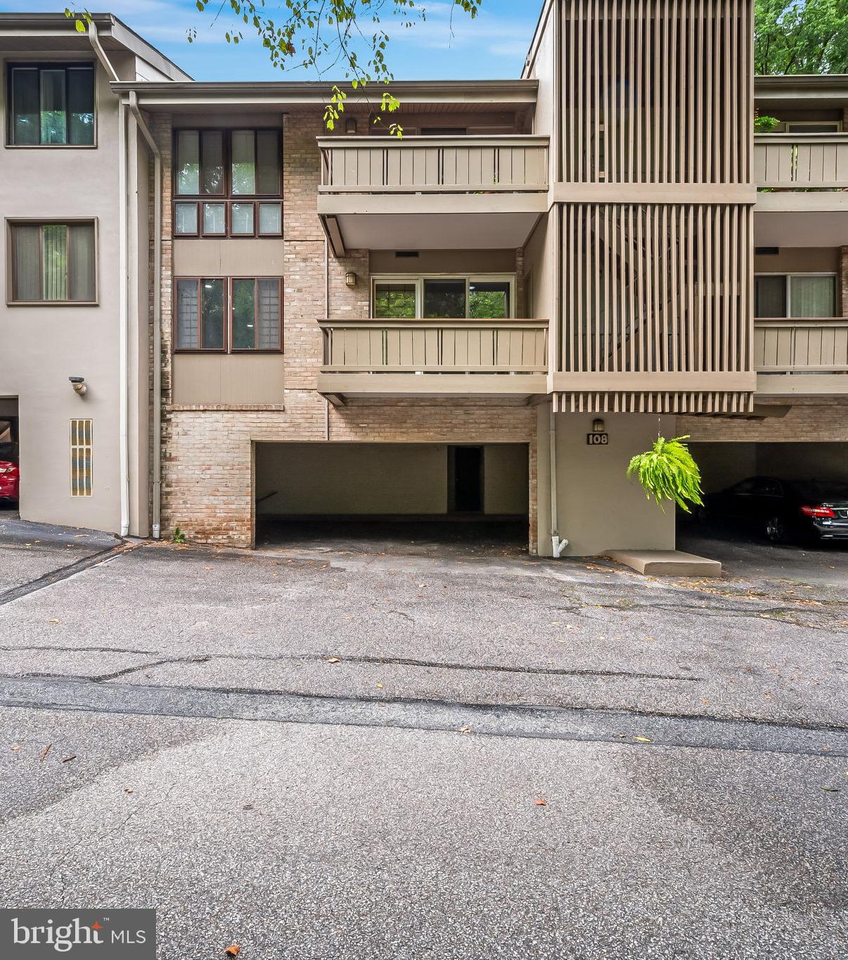 108 Cross Keys Road, Unit R108D Baltimore, MD 21210 - Photo 3 of 37 rear covered parking