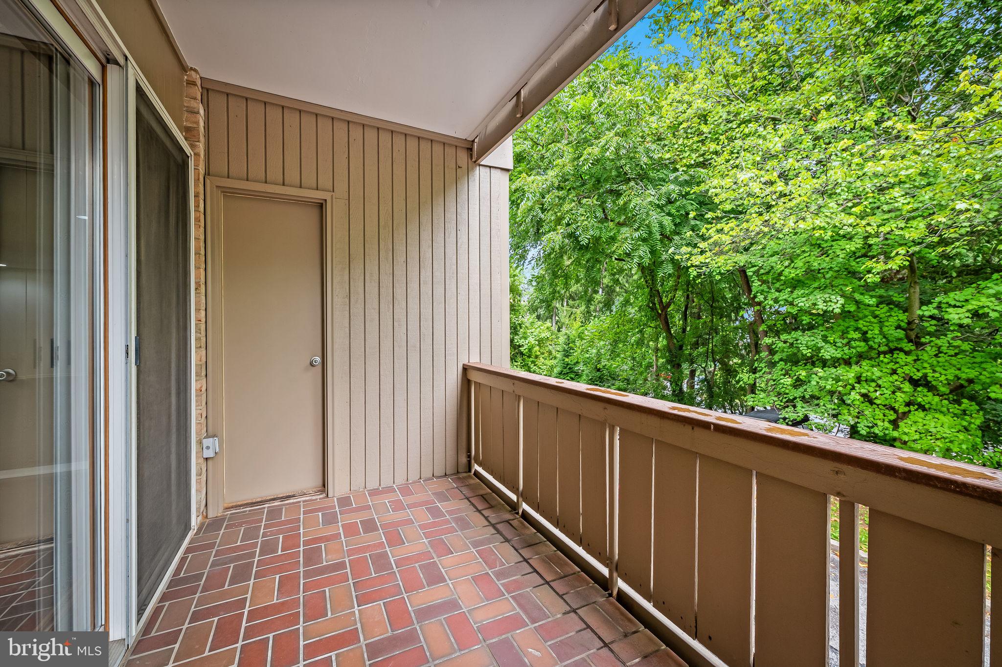 108 Cross Keys Road, Unit R108D Baltimore, MD 21210 - Photo 32 of 37 balcony facing trees
