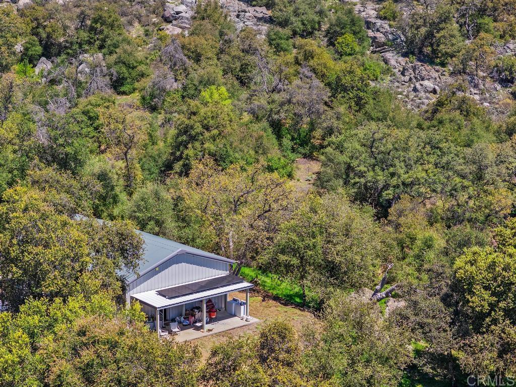 25677 Mesa Grande Road Santa Ysabel, CA 92070 - Photo 12 of 28 an aerial view of a house with a yard