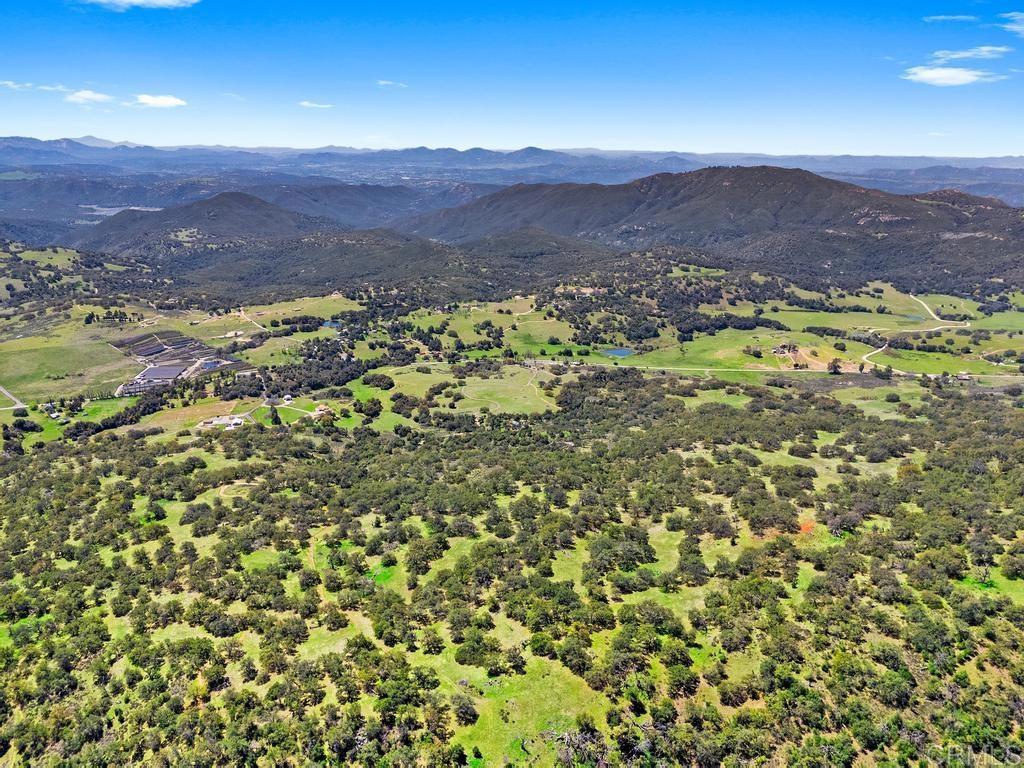25677 Mesa Grande Road Santa Ysabel, CA 92070 - Photo 23 of 28 a view of a city with mountains in the background
