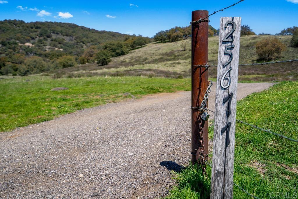 25677 Mesa Grande Road Santa Ysabel, CA 92070 - Photo 4 of 28 a view of a road with a yard