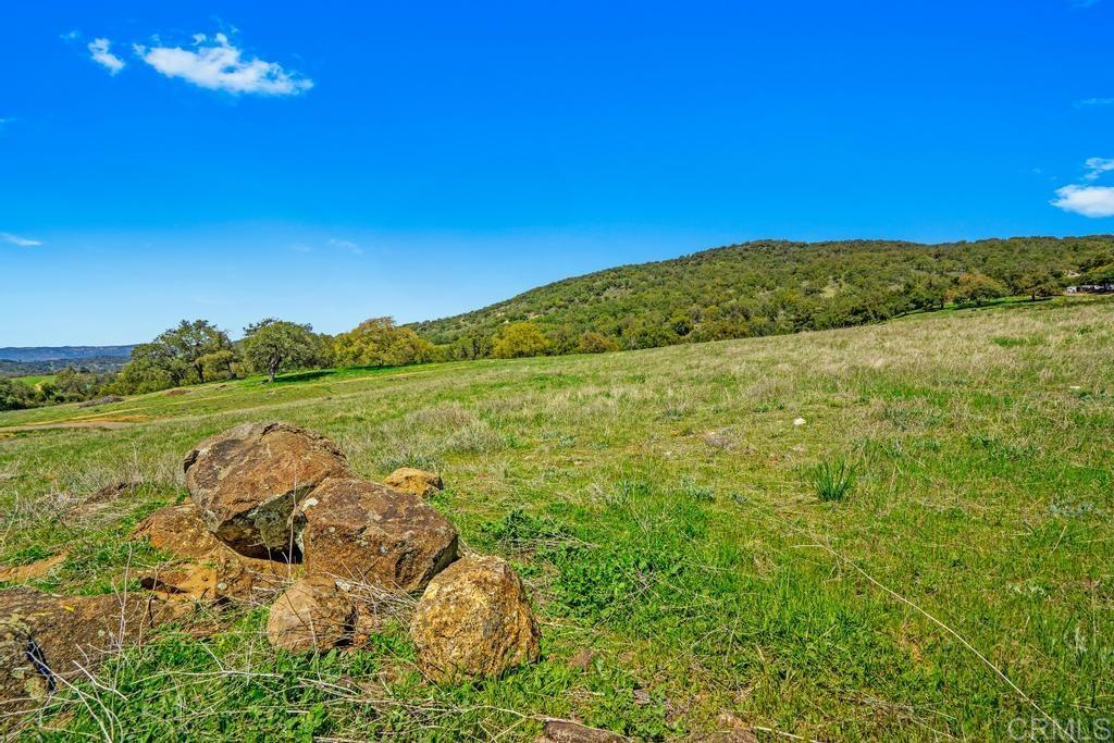 25677 Mesa Grande Road Santa Ysabel, CA 92070 - Photo 8 of 28 a view of a lake with a yard