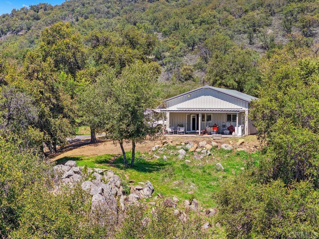 25677 Mesa Grande Road Santa Ysabel, CA 92070 - Photo 10 of 28 a front view of a house with garden