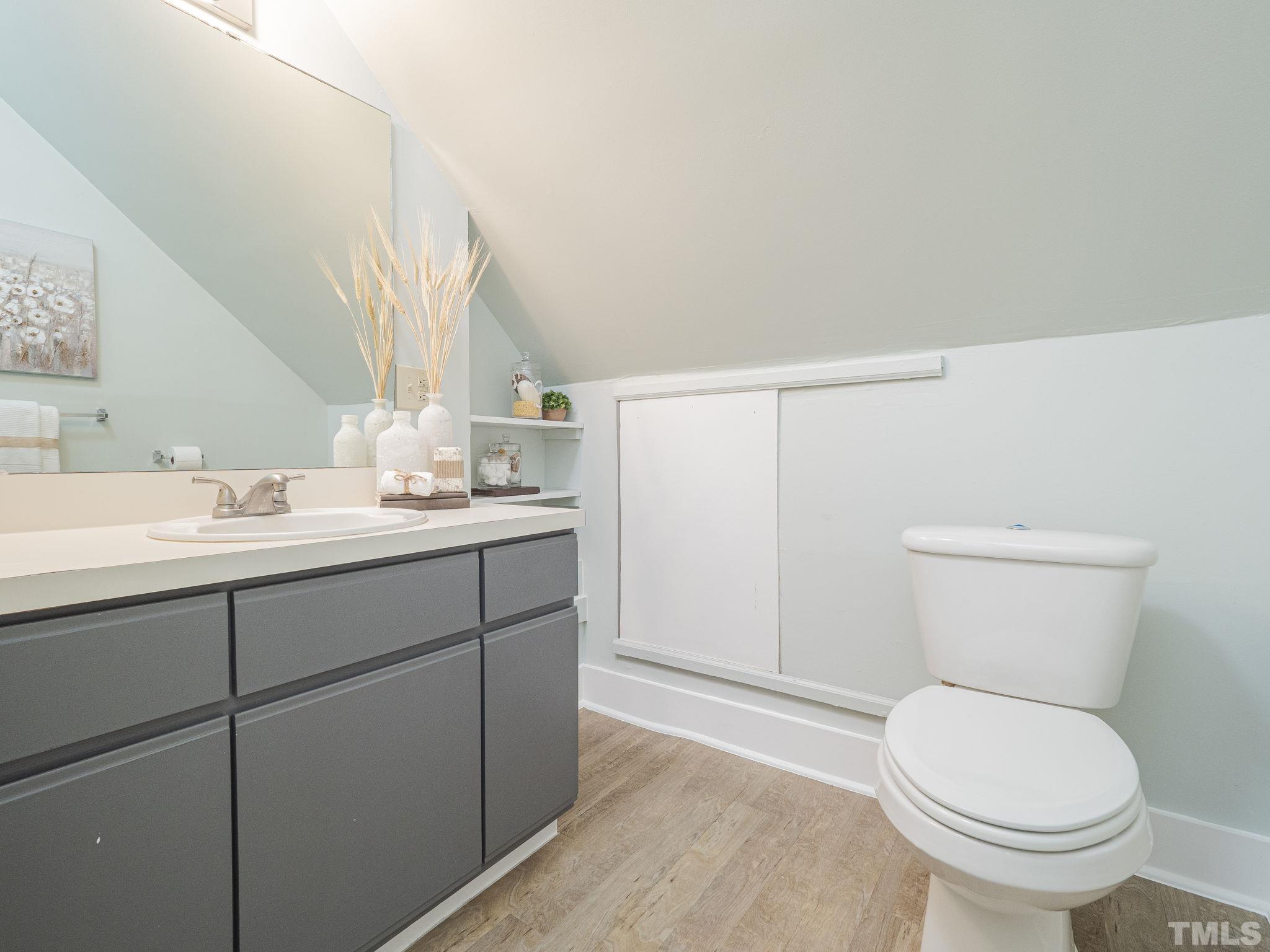 4821 Purnell Road Wake Forest, NC 27587 - Photo 11 of 19 a bathroom with a sink and a toilet