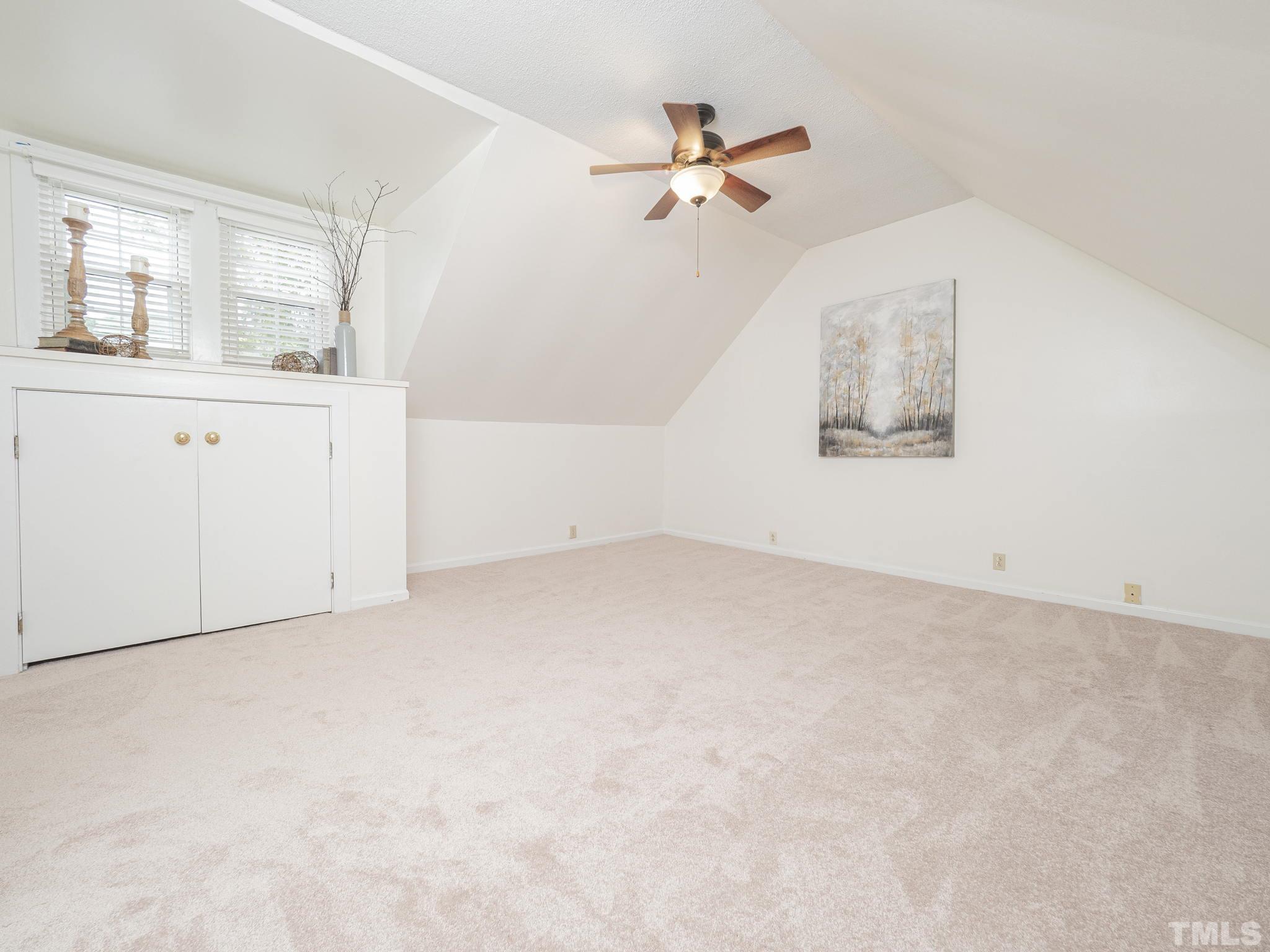 4821 Purnell Road Wake Forest, NC 27587 - Photo 12 of 19 a view of a room with a vanity and fan