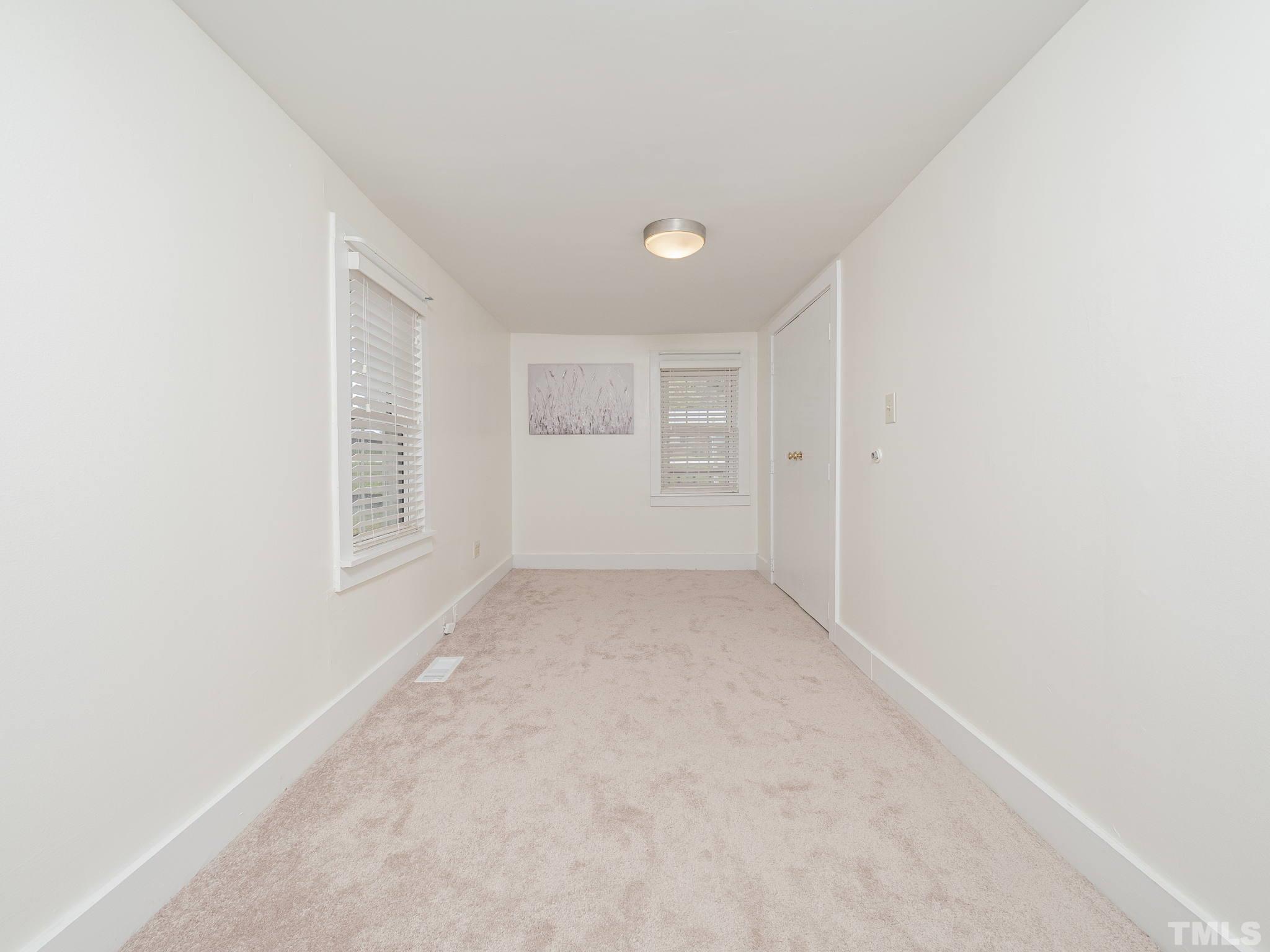 4821 Purnell Road Wake Forest, NC 27587 - Photo 16 of 19 a view of an empty room with a window