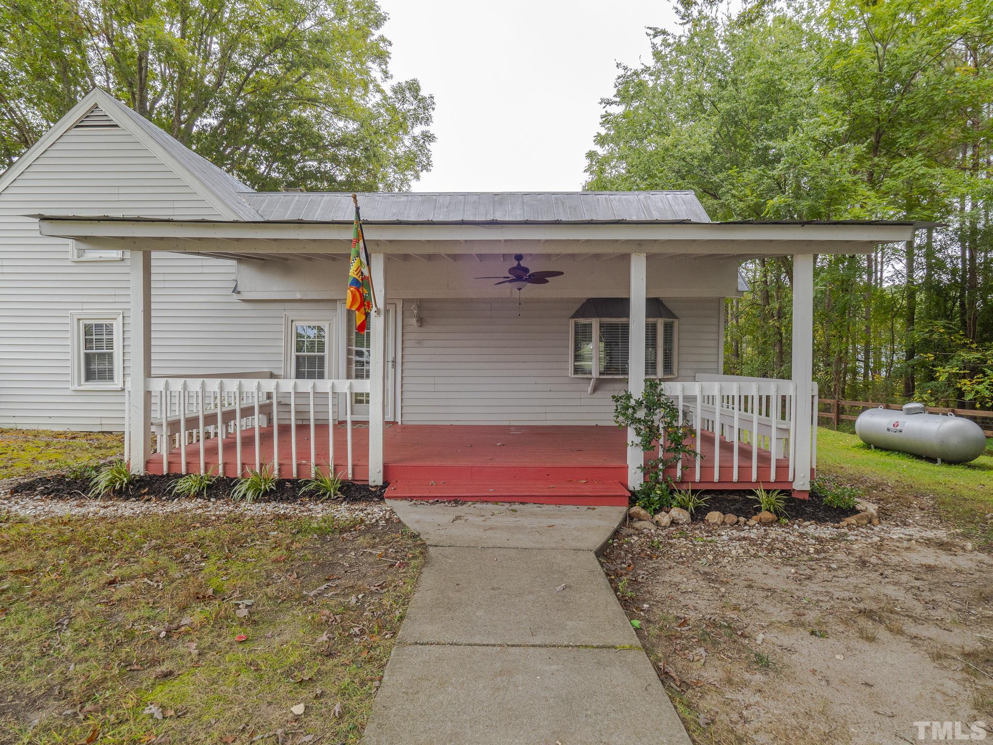 4821 Purnell Road Wake Forest, NC 27587 - Photo 5 of 19 front view of a house with a outdoor space
