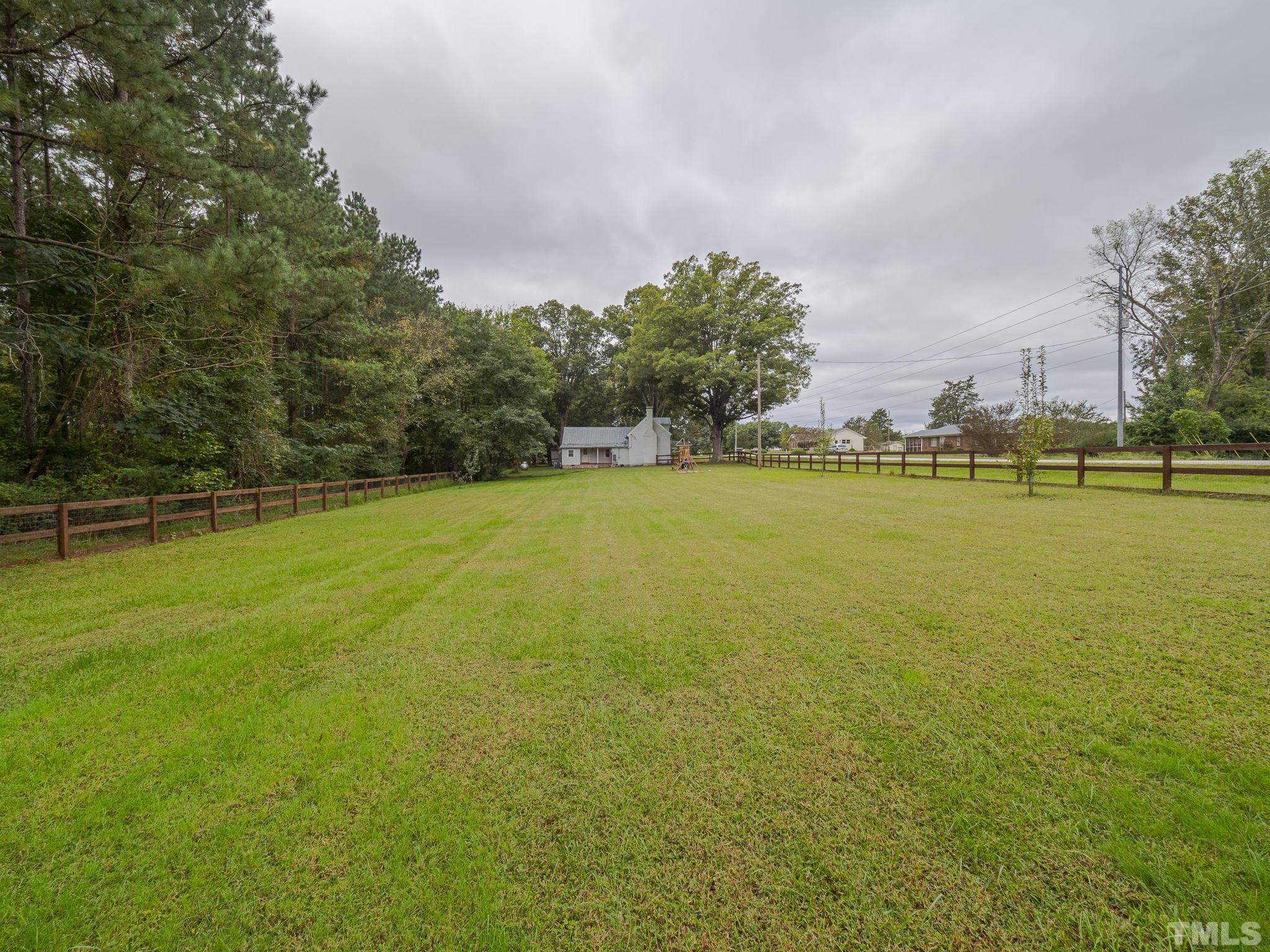 4821 Purnell Road Wake Forest, NC 27587 - Photo 8 of 19 a view of a swimming pool and an outdoor space