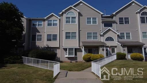 936 Edpas Road New Brunswick, NJ 08901 - Photo 1 of 18 a front view of a house with garden