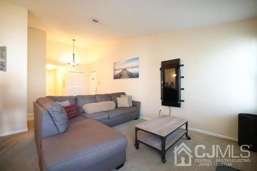 936 Edpas Road New Brunswick, NJ 08901 - Photo 5 of 18 a living room with furniture and a flat screen tv