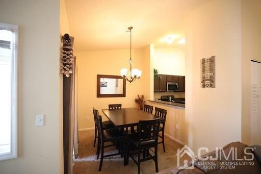 936 Edpas Road New Brunswick, NJ 08901 - Photo 6 of 18 a view of a dining room with furniture and window