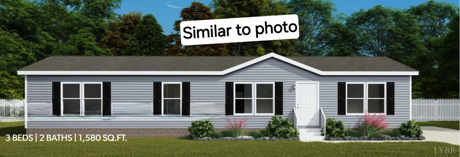 a view of a house with sign board and garden