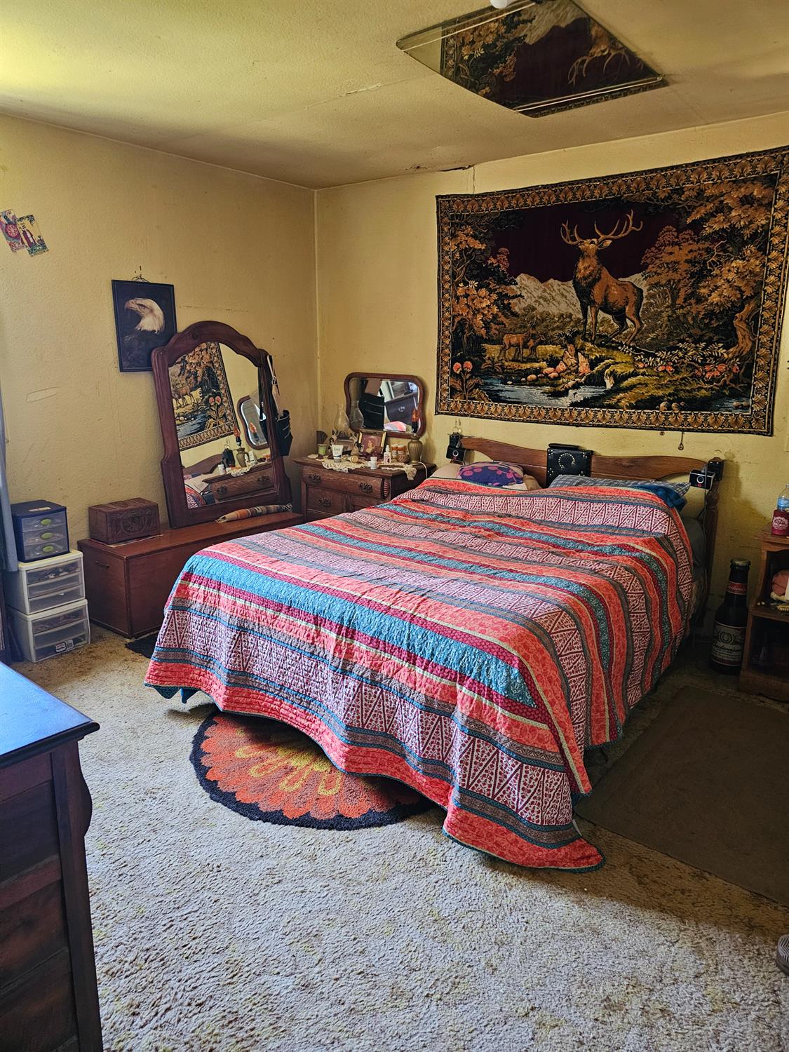 250 Acorn Way West Point, CA 95255 - Photo 16 of 32 a bedroom with a bed and dresser