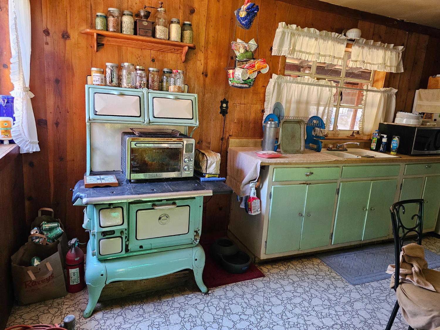 250 Acorn Way West Point, CA 95255 - Photo 18 of 32 a room with lots of wooden furniture and a baby crib