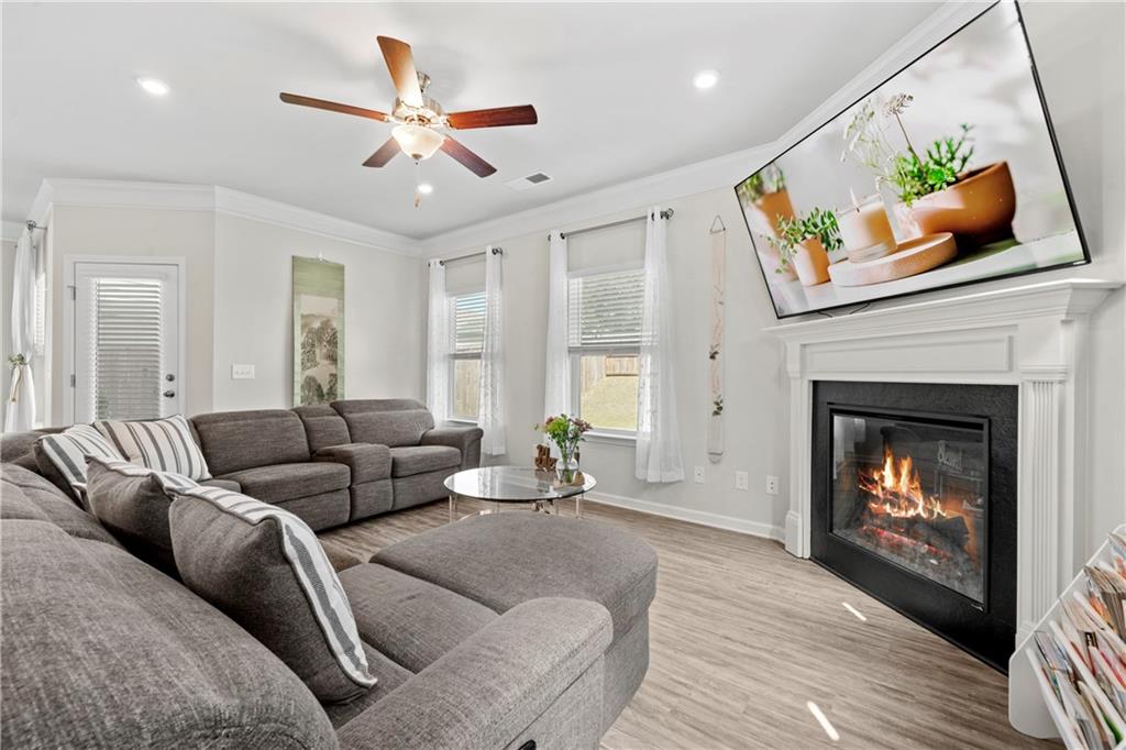 103 Waterside Drive Calhoun, GA 30701 - Photo 18 of 48 a living room with furniture and a fireplace