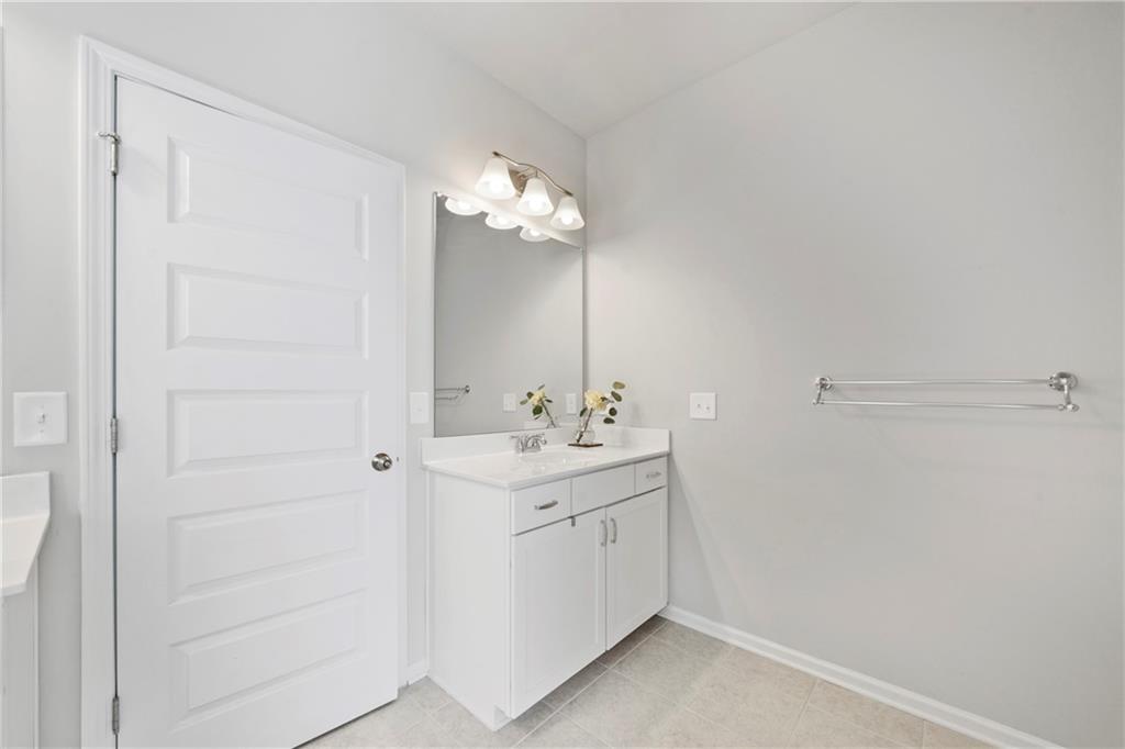 103 Waterside Drive Calhoun, GA 30701 - Photo 29 of 48 a bathroom with a sink and a mirror