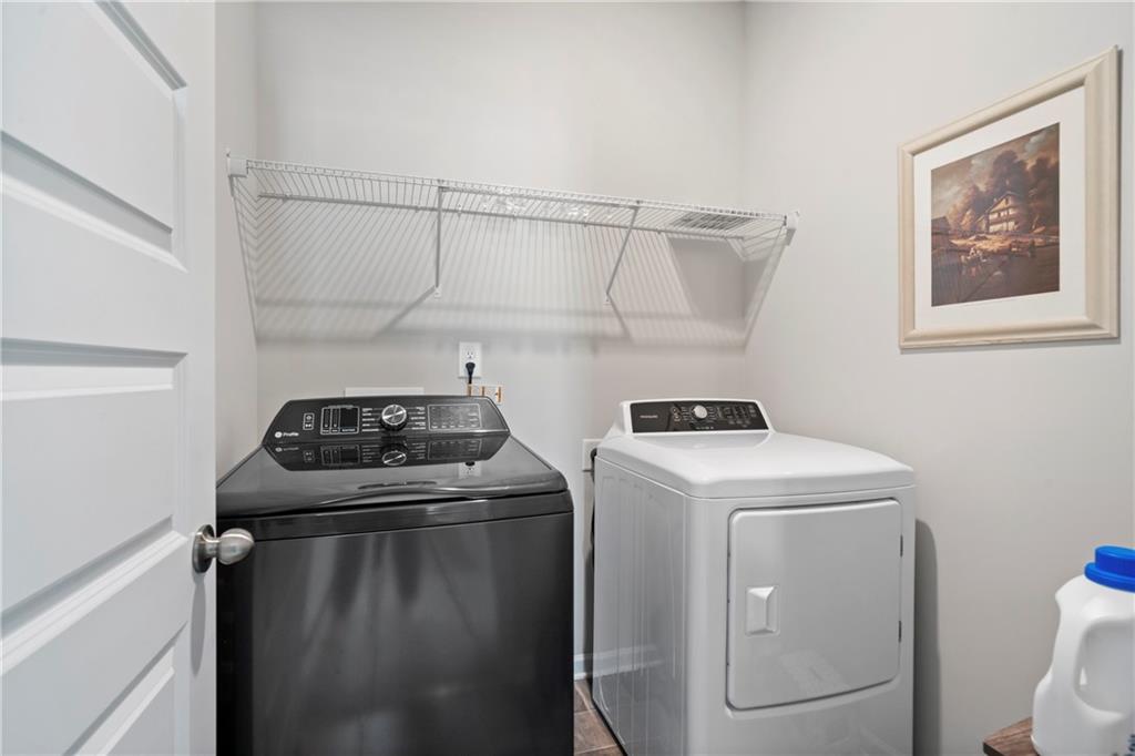 103 Waterside Drive Calhoun, GA 30701 - Photo 30 of 48 a utility room with dryer and washer
