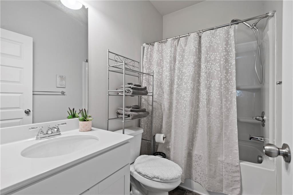 103 Waterside Drive Calhoun, GA 30701 - Photo 32 of 48 a bathroom with a sink toilet and shower